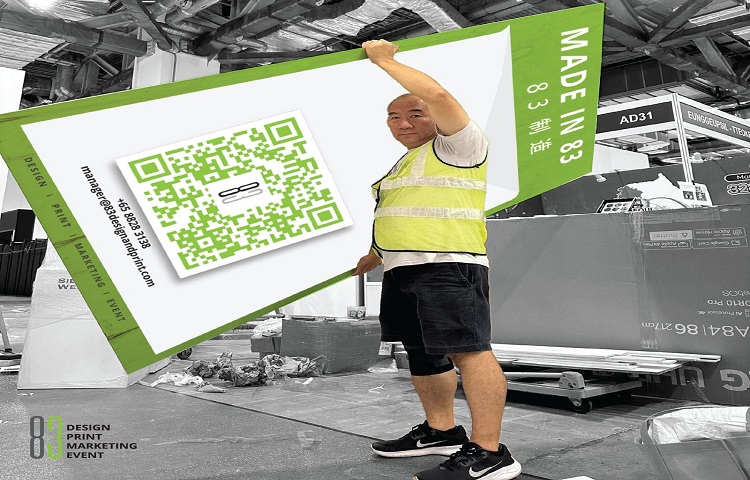 Worker holding exhibition booth